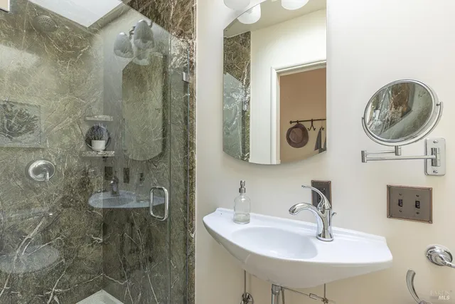 a view of a house with a yard and garage