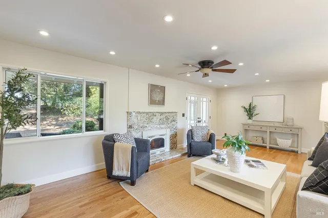 a kitchen with stainless steel appliances granite countertop a refrigerator sink and cabinets