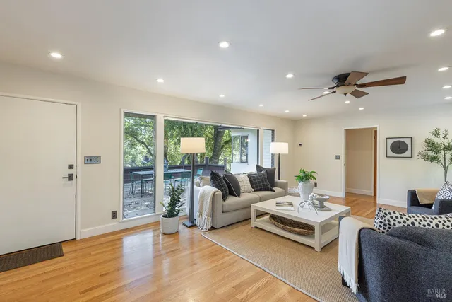 a kitchen with stainless steel appliances granite countertop a stove and a sink