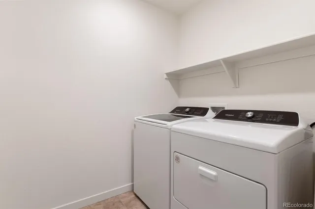 a view of a chairs and table in patio