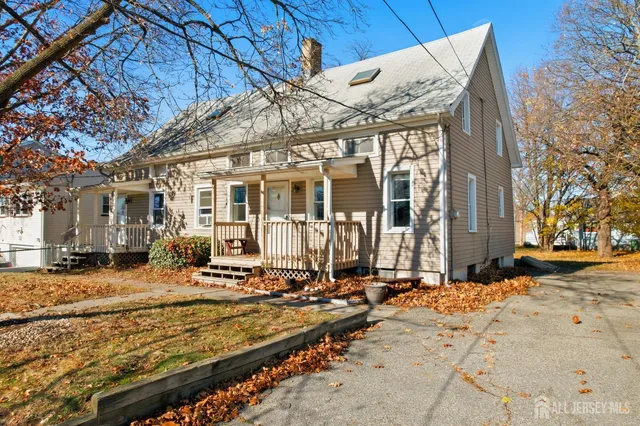 a view of a house with snow on the ground