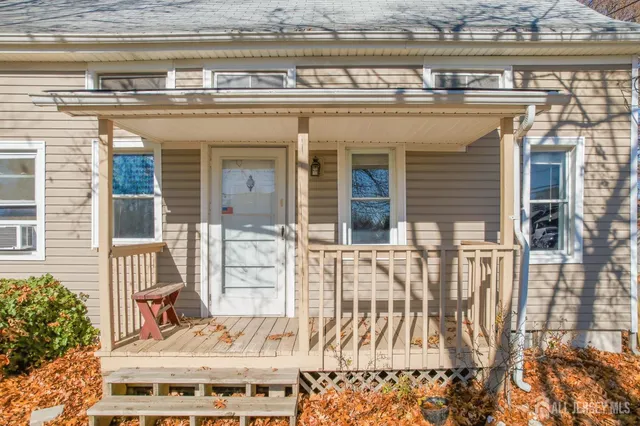 a view of a balcony with a potted plant