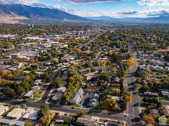 190 West 700 North Logan, UT 84321 - Photo 34 of 51 Aerial view of property's location featuring a mountainous background and nearby suburban area
