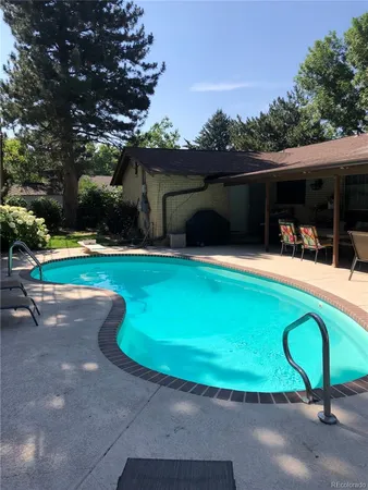 a view of outdoor space with swimming pool