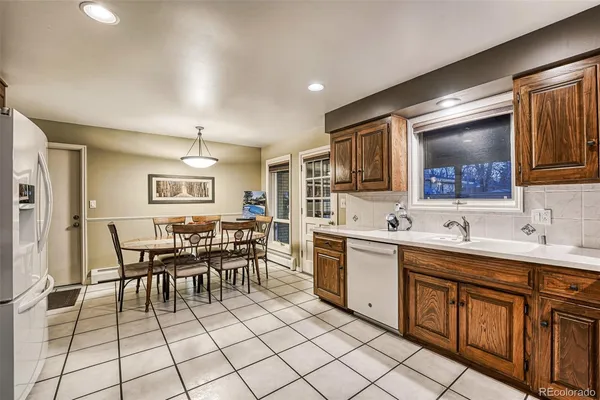a kitchen that has a cabinets counter space and appliances