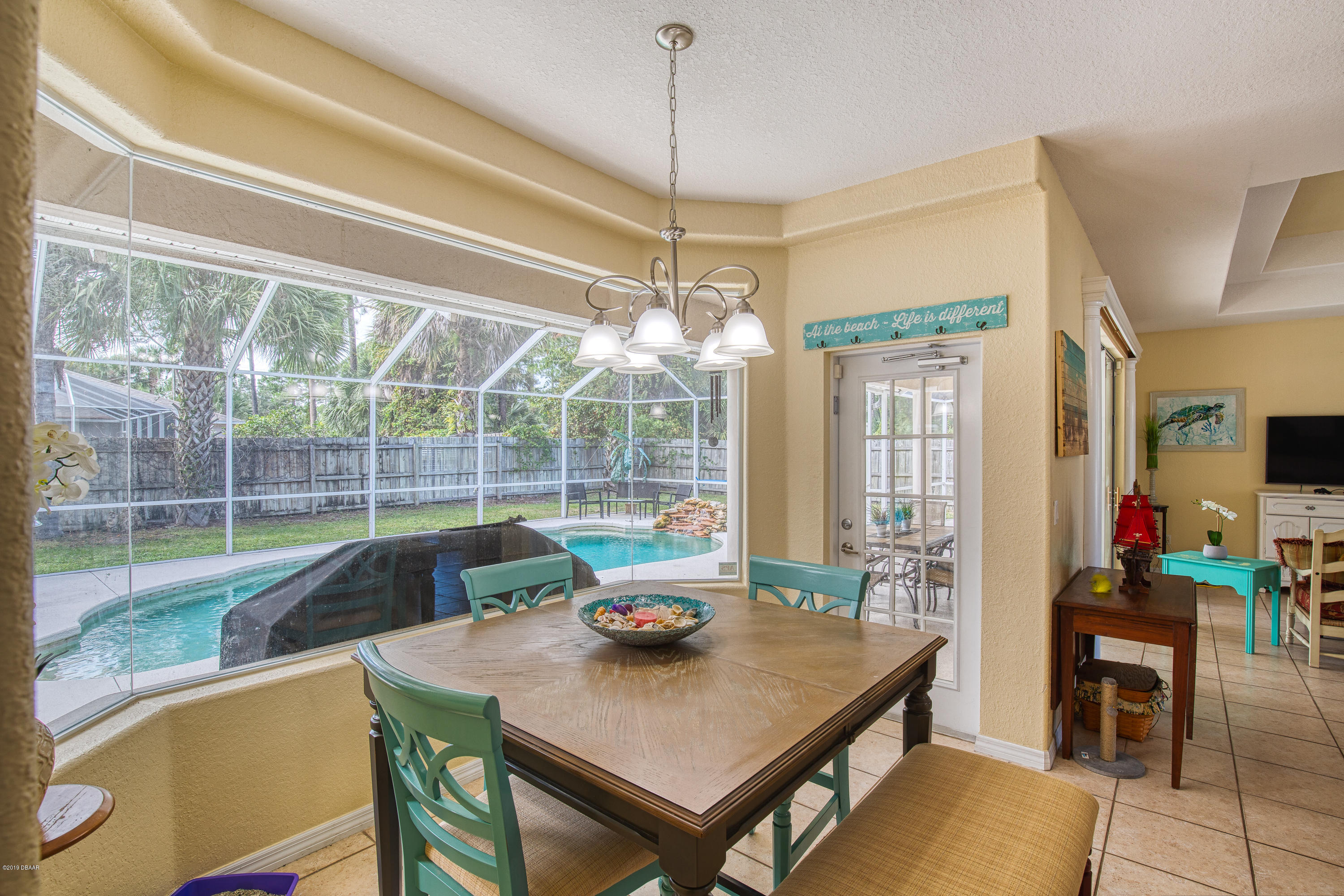 36 Pine Tree Drive Palm Coast, FL 32164 - Photo 11 of 52 a view of a dining room and livingroom view