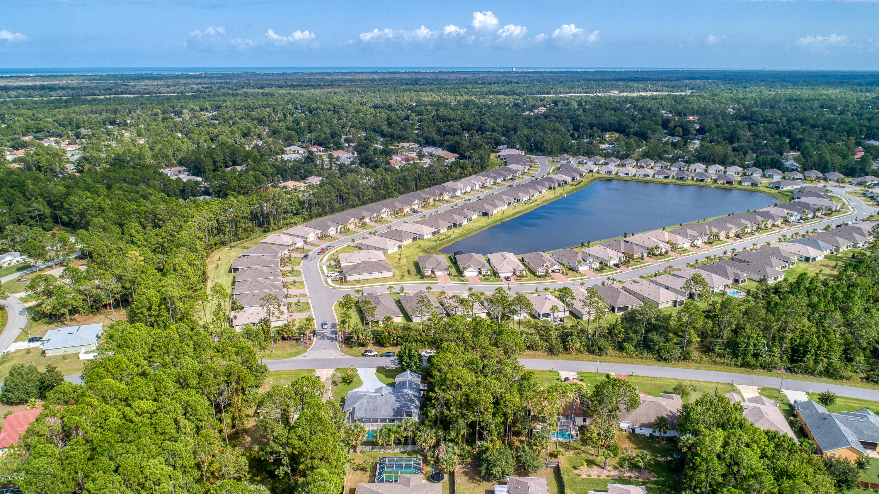 36 Pine Tree Drive Palm Coast, FL 32164 - Photo 48 of 52 a view of a city with an ocean