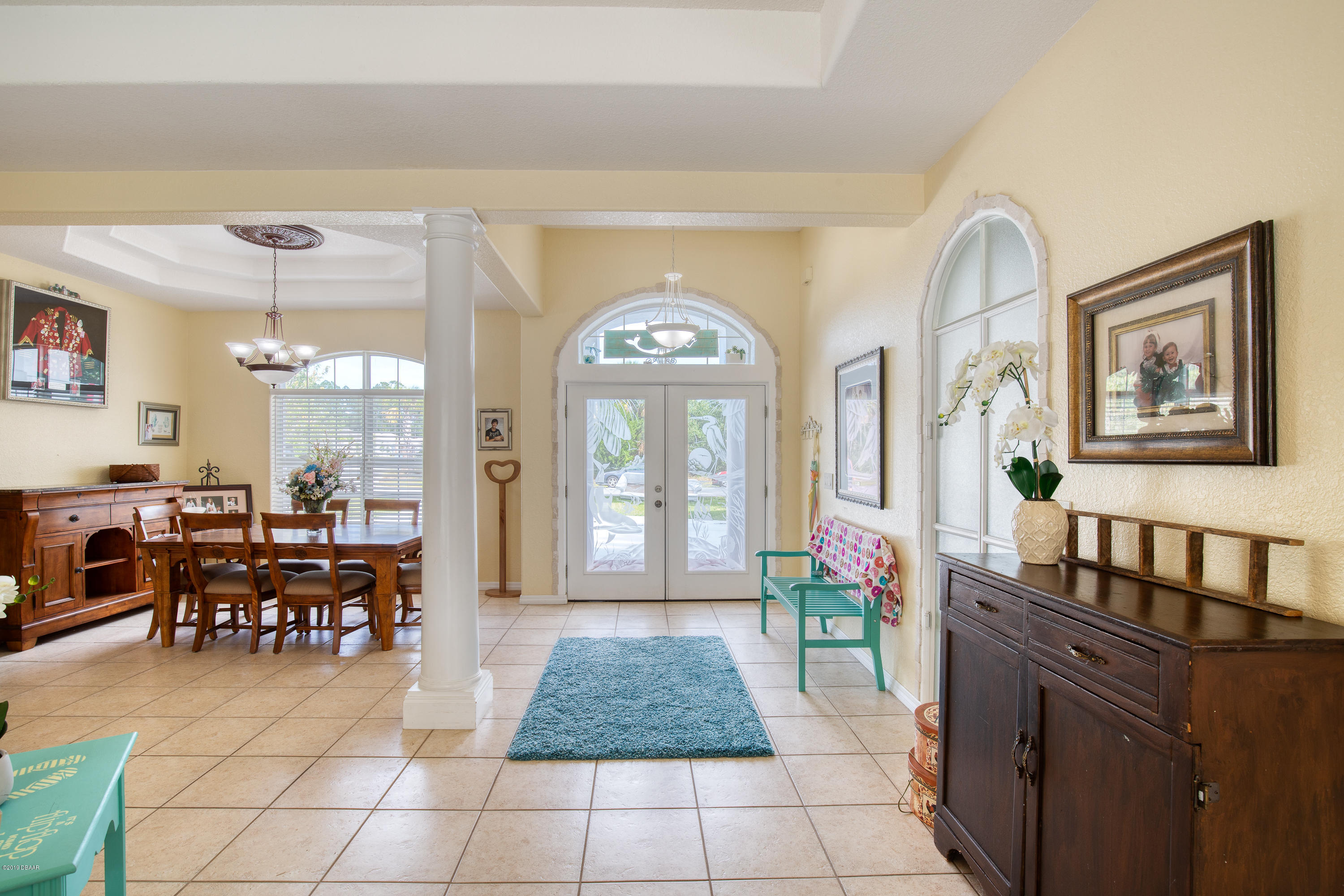 36 Pine Tree Drive Palm Coast, FL 32164 - Photo 6 of 52 a dining hall with furniture and a large window