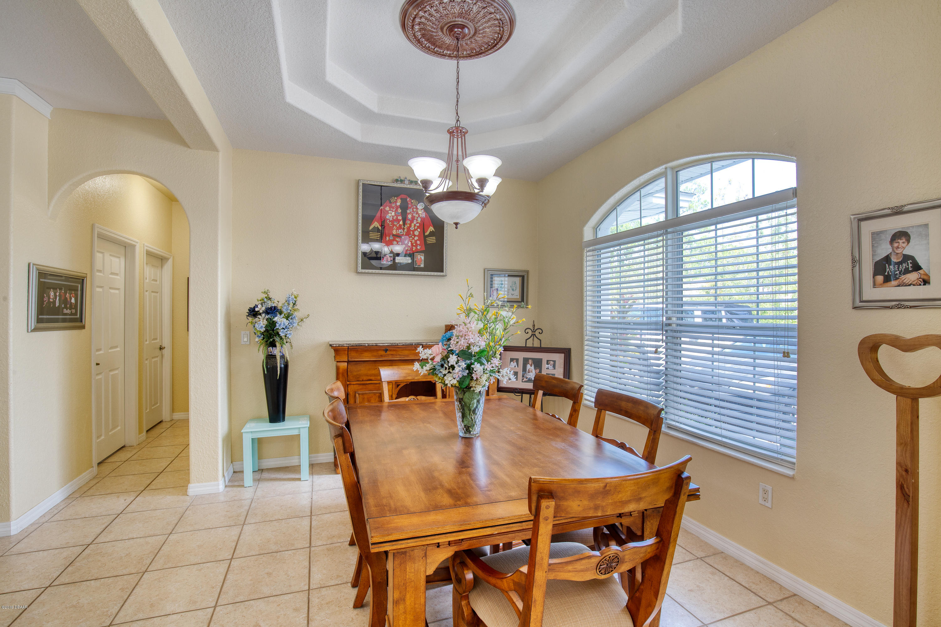 36 Pine Tree Drive Palm Coast, FL 32164 - Photo 8 of 52 a dining room with furniture and window