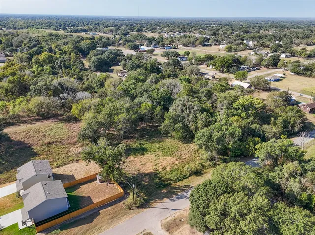 an aerial view of residential house with parking space