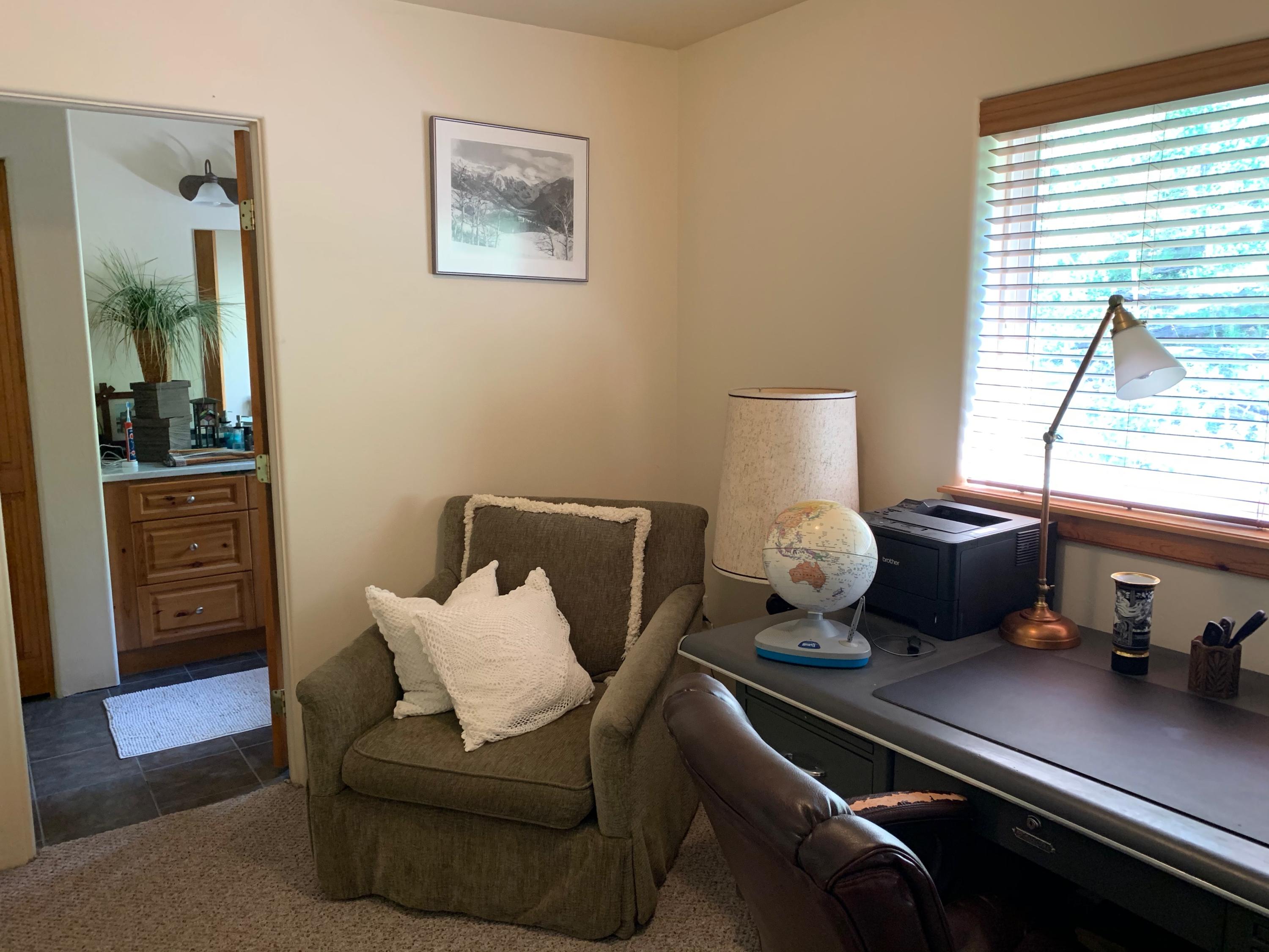 323 Adams Ranch Road, Unit 5B Mountain Village, CO 81435 - Photo 16 of 30 a living room with furniture and window
