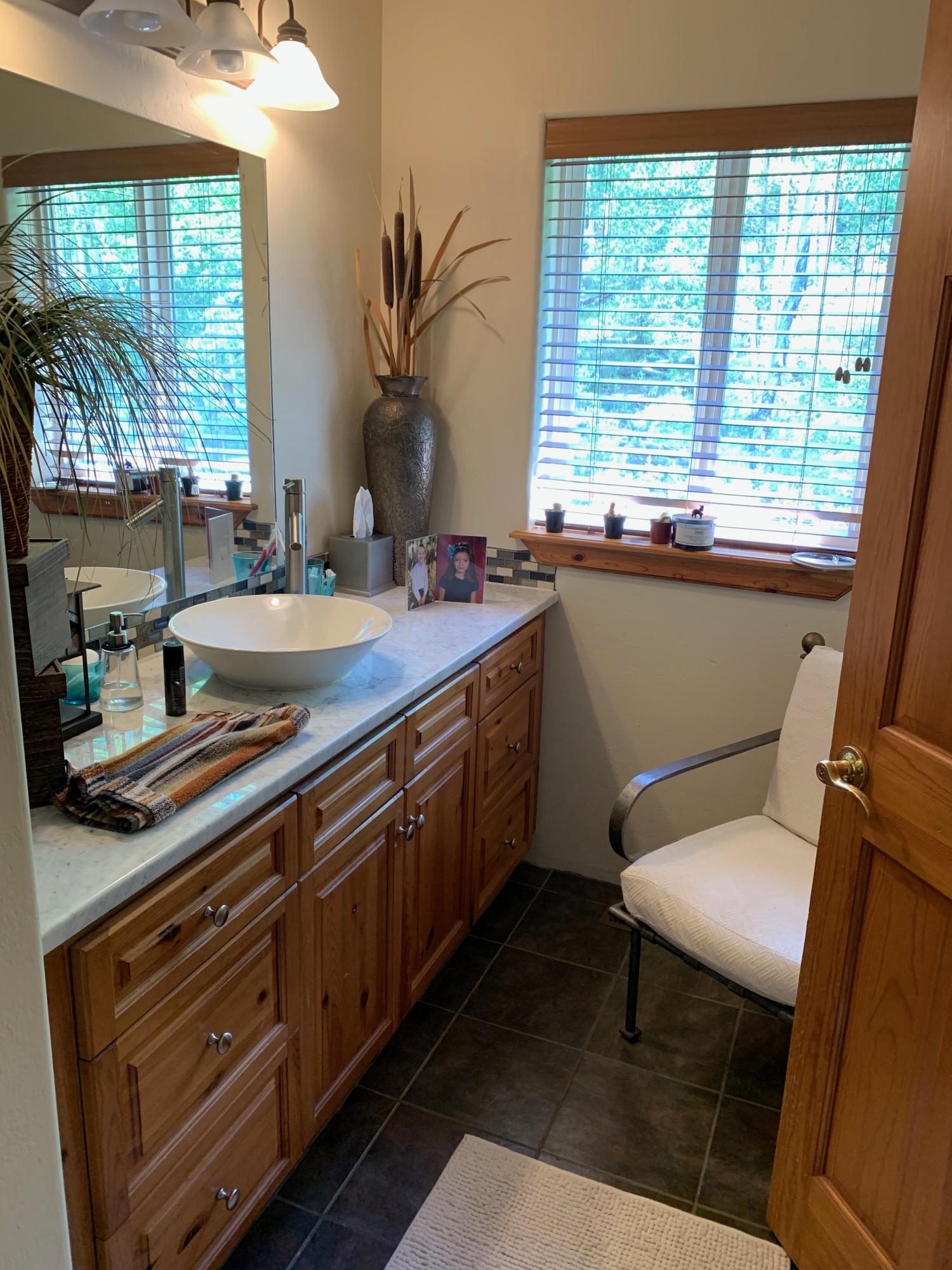 323 Adams Ranch Road, Unit 5B Mountain Village, CO 81435 - Photo 18 of 30 a kitchen with a sink stove and cabinets