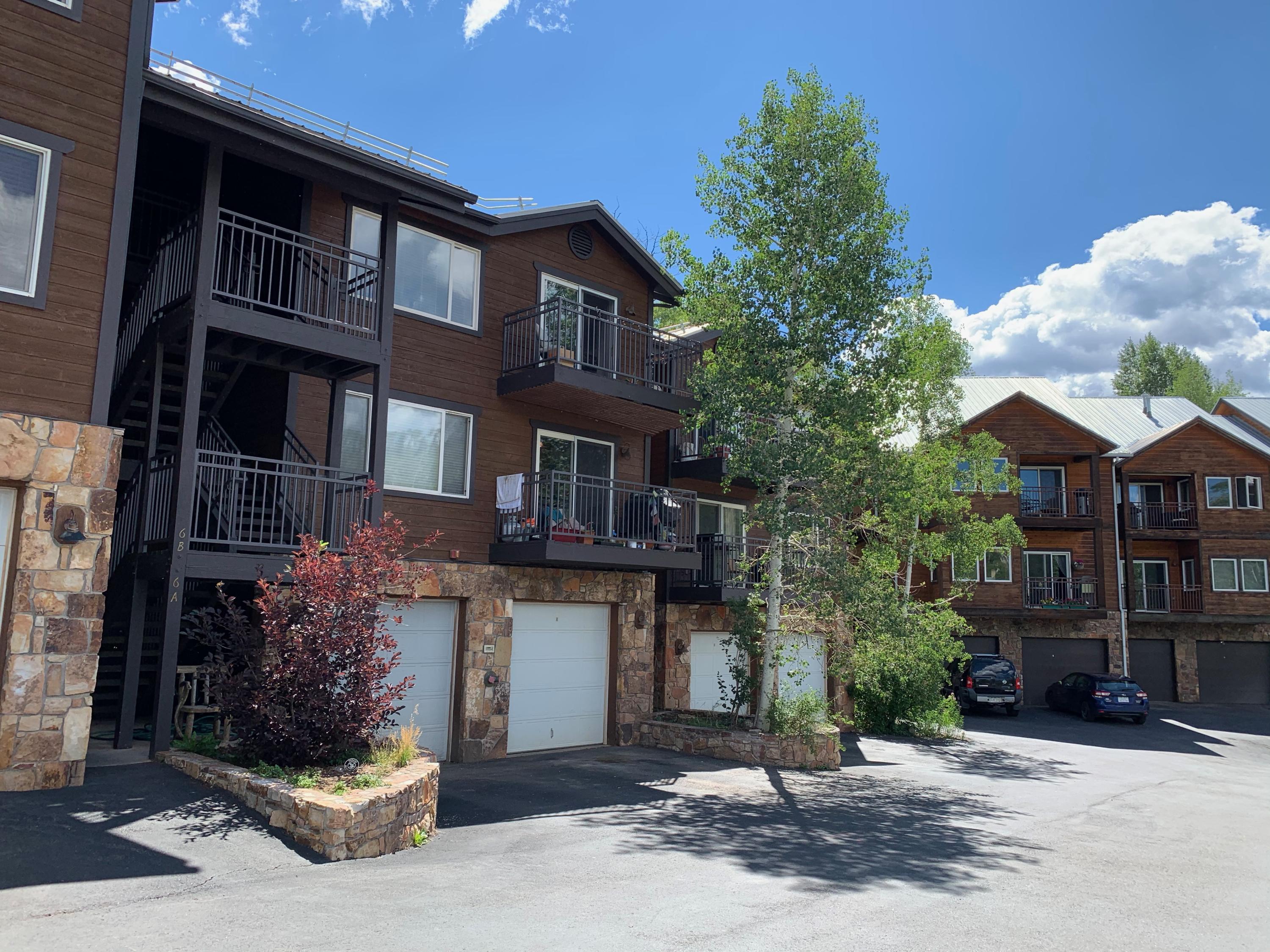 323 Adams Ranch Road, Unit 5B Mountain Village, CO 81435 - Photo 27 of 30 a front view of a house