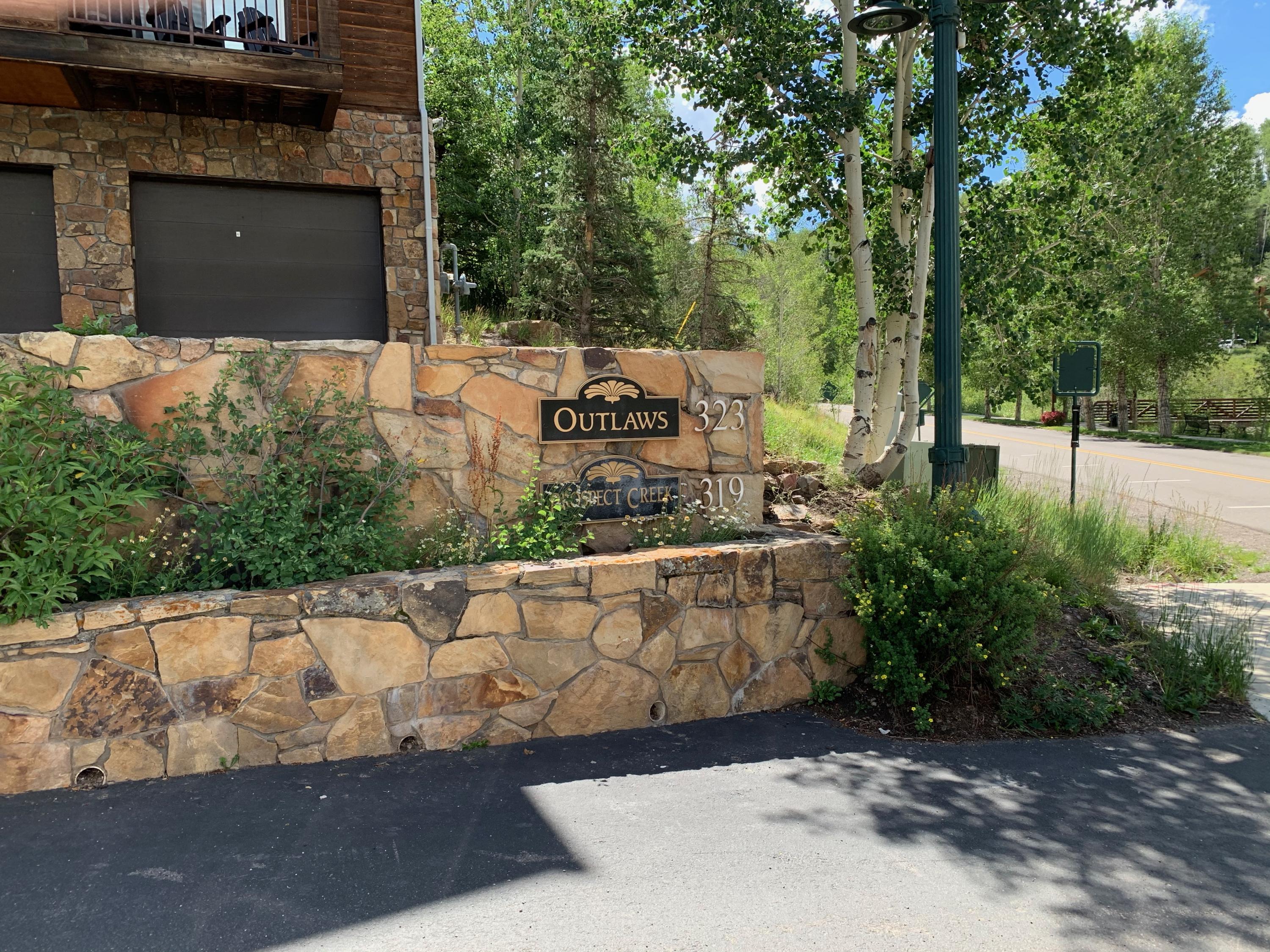 323 Adams Ranch Road, Unit 5B Mountain Village, CO 81435 - Photo 30 of 30 a view of a garden with an outdoor space
