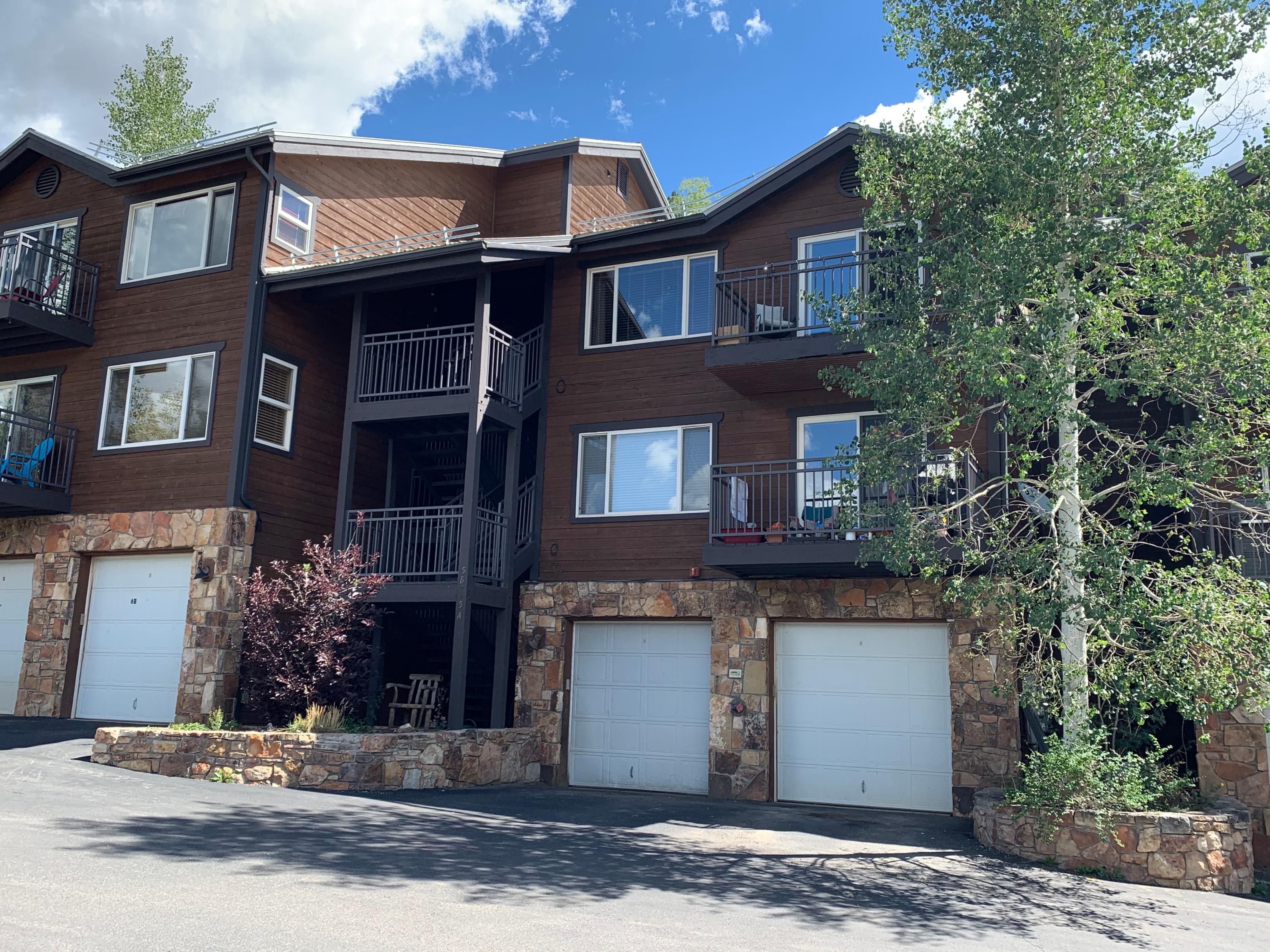 323 Adams Ranch Road, Unit 5B Mountain Village, CO 81435 - Photo 4 of 30 a front view of a house