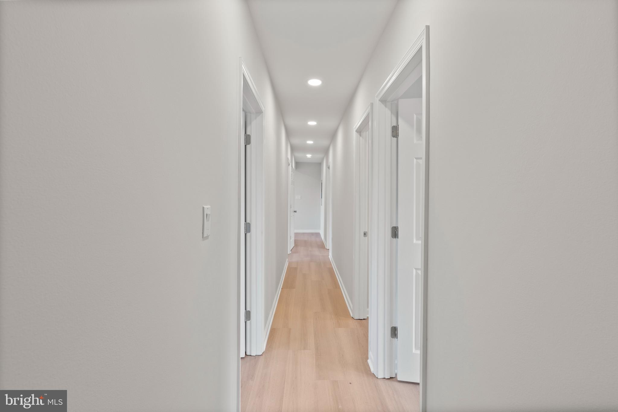 730 New Pittsburg Avenue, Unit 1 Baltimore, MD 21222 - Photo 11 of 27 a view of a hallway with wooden floor