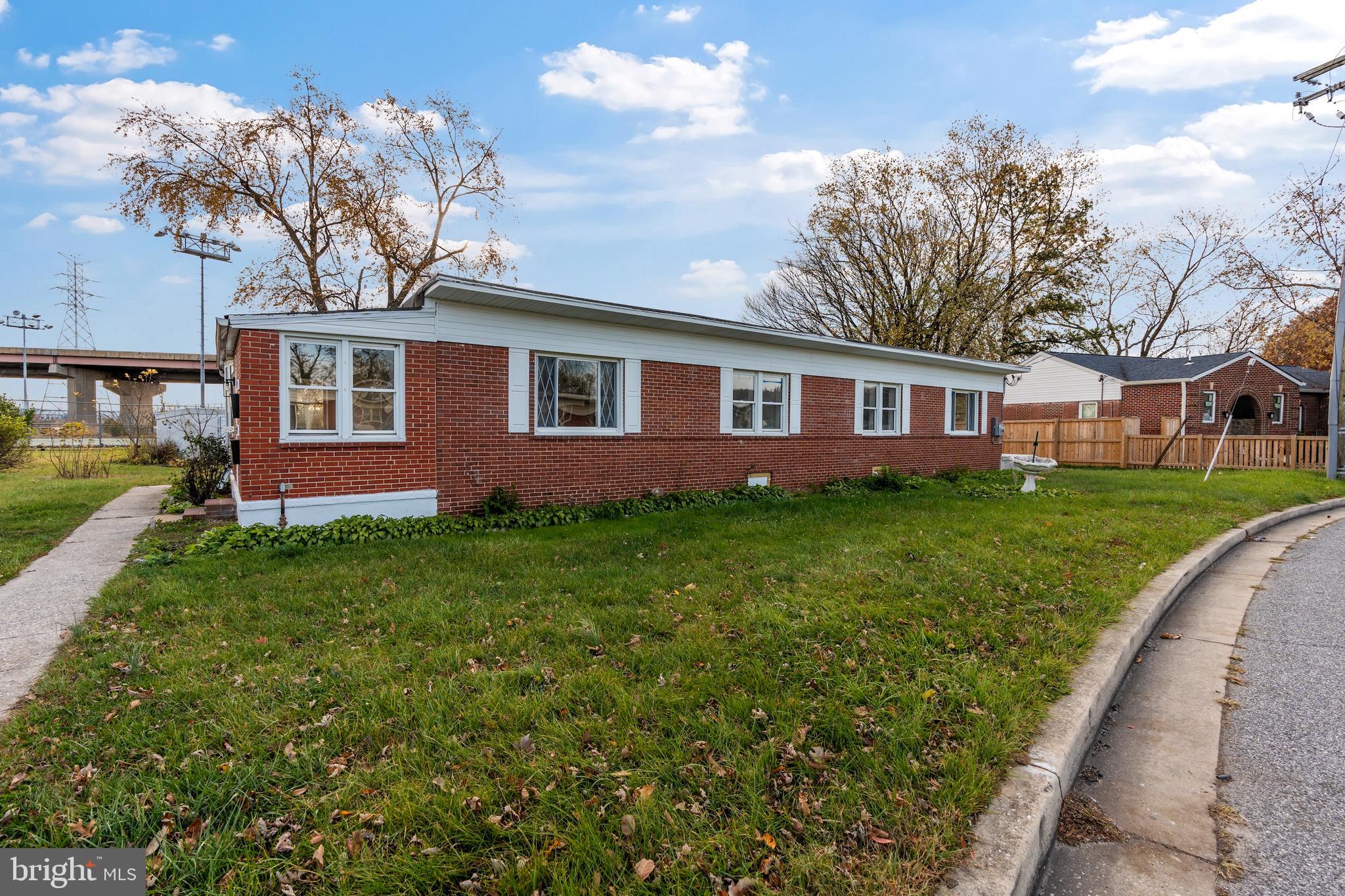 730 New Pittsburg Avenue, Unit 1 Baltimore, MD 21222 - Photo 2 of 27 a view of house with a yard