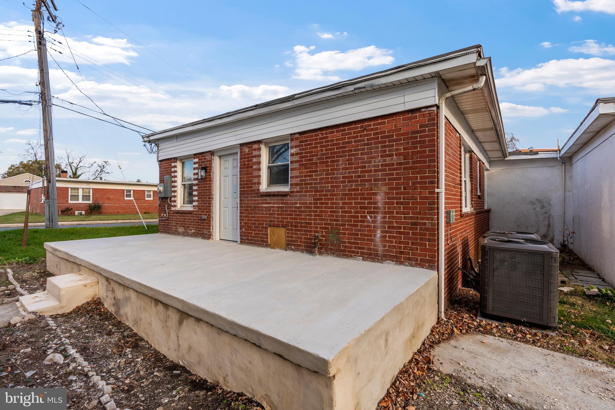 730 New Pittsburg Avenue, Unit 1 Baltimore, MD 21222 - Photo 26 of 27 a backyard of a house with seating space