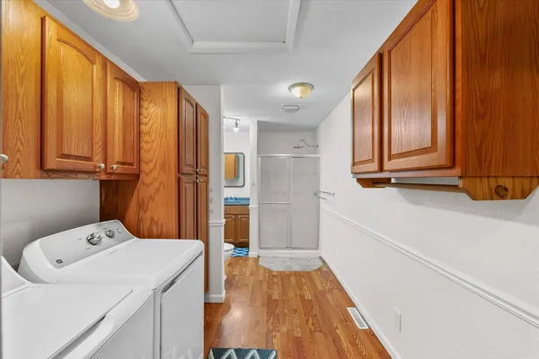 a bathroom with a shower and a toilet