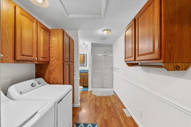a bathroom with a shower and a toilet