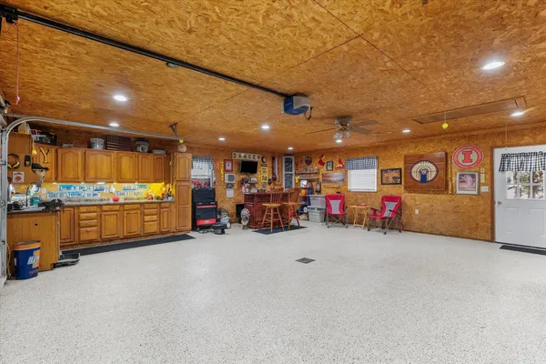 a house that has a tree in front of it