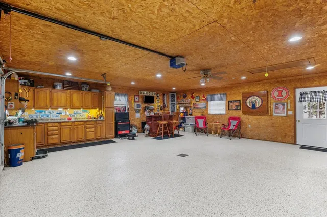 a house that has a tree in front of it