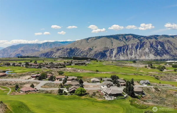 a view of a golf course with a swimming pool