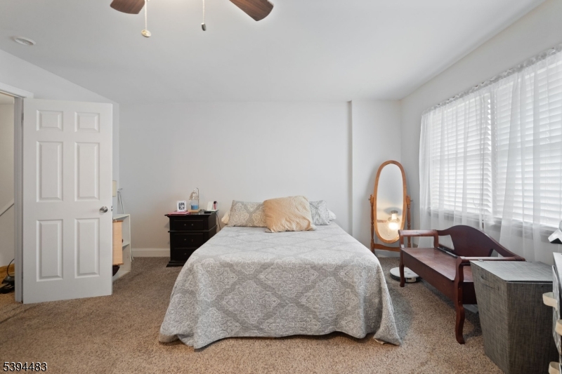 919 Robin Road Hillsborough, NJ 08844 - Photo 13 of 21 a bedroom with bed and a window