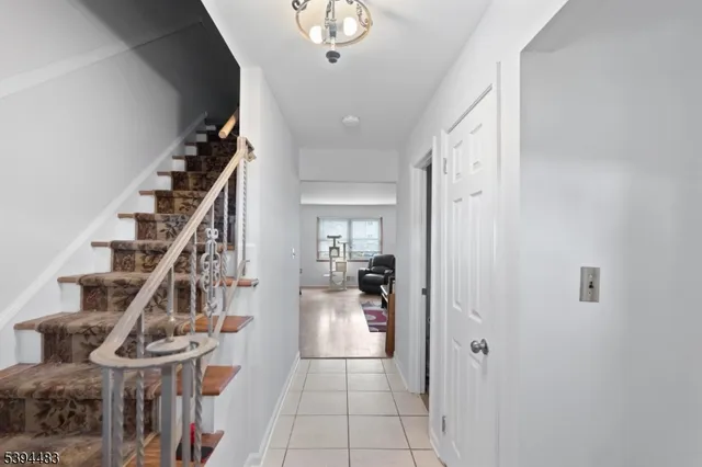 a view of an entryway with stairs