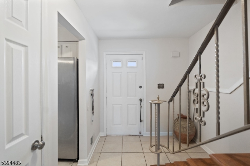 919 Robin Road Hillsborough, NJ 08844 - Photo 21 of 21 a view of an entryway with stairs