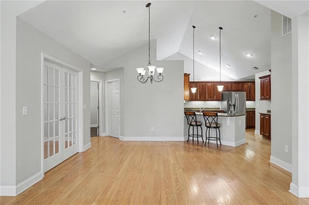 214 Highlands Ridge Place, Unit 3 Smyrna, GA 30082 - Photo 13 of 25 a view of a kitchen and dining room