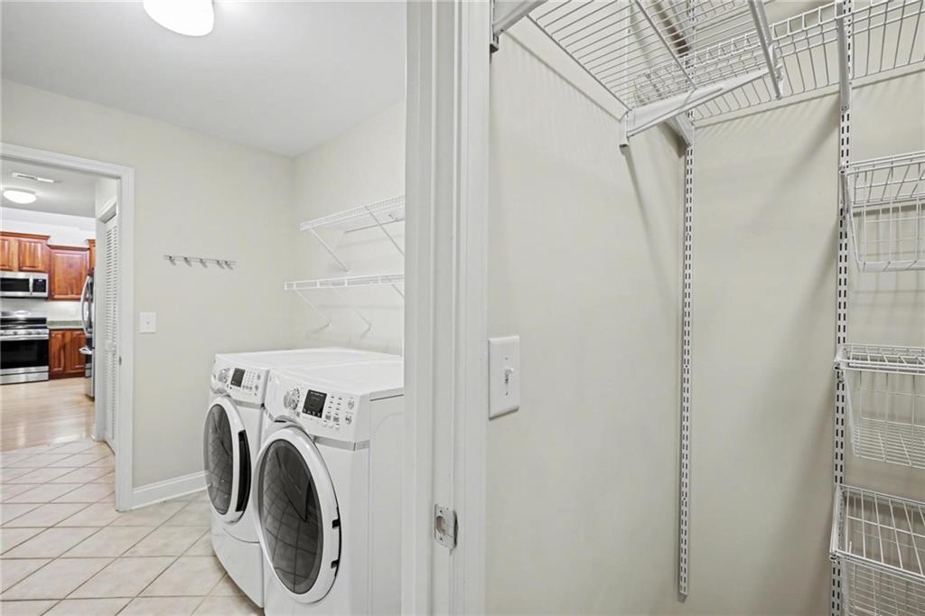 214 Highlands Ridge Place, Unit 3 Smyrna, GA 30082 - Photo 25 of 25 a utility room with dryer and washer