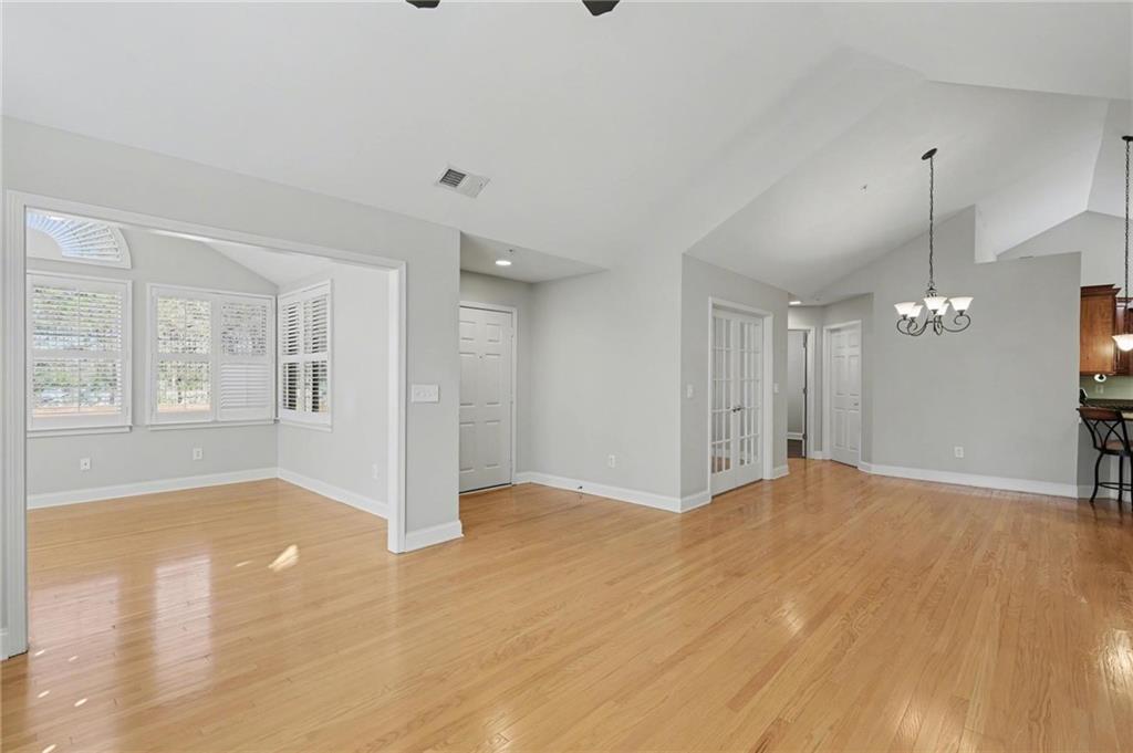 214 Highlands Ridge Place, Unit 3 Smyrna, GA 30082 - Photo 4 of 25 a view of an empty room with window and wooden floor