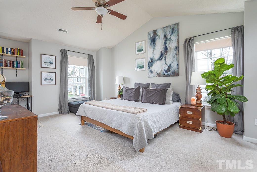 9312 Copernicus Court Raleigh, NC 27617 - Photo 18 of 30 Stunning space with vaulted ceilings and lots of windows.