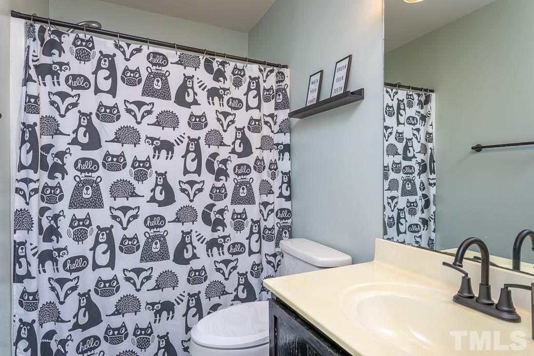 9312 Copernicus Court Raleigh, NC 27617 - Photo 22 of 30 2nd full bathroom upstairs.
