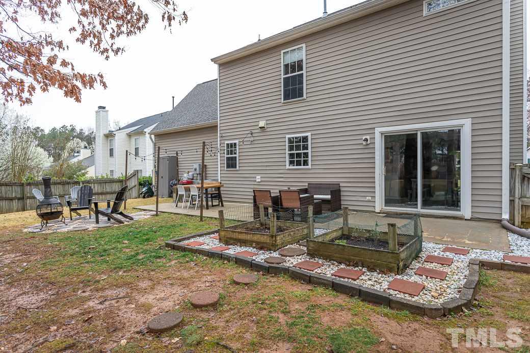 9312 Copernicus Court Raleigh, NC 27617 - Photo 25 of 30 Ample patio space for the perfect entertainment area!