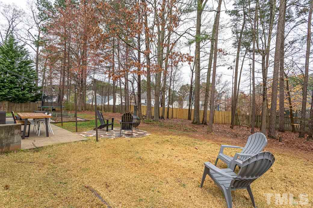 9312 Copernicus Court Raleigh, NC 27617 - Photo 28 of 30 Large fenced back yard.
