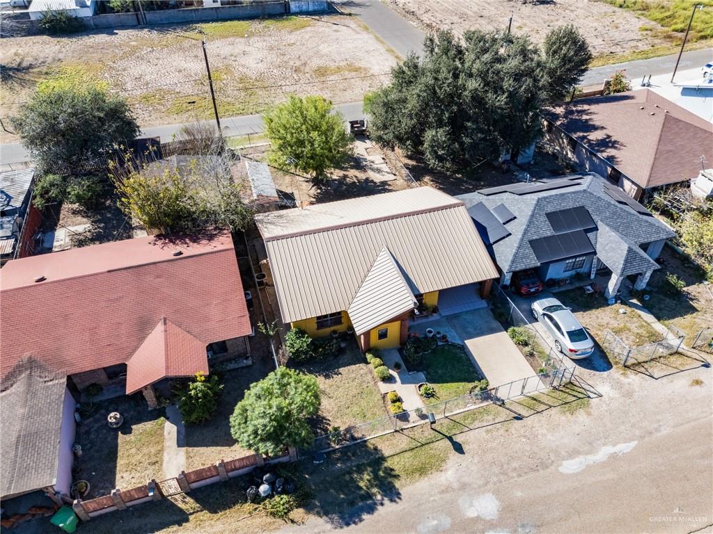 264 West Huisache Street Rio Grande City, TX 78582 - Photo 16 of 16 a view of a patio with table and chairs near a yard
