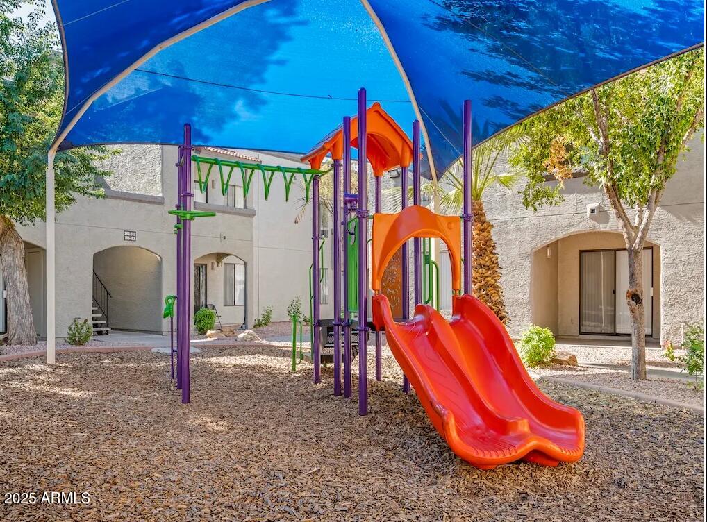 5750 North 59th Avenue, Unit 1B Glendale, AZ 85301 - Photo 11 of 11 a view of a park with slide