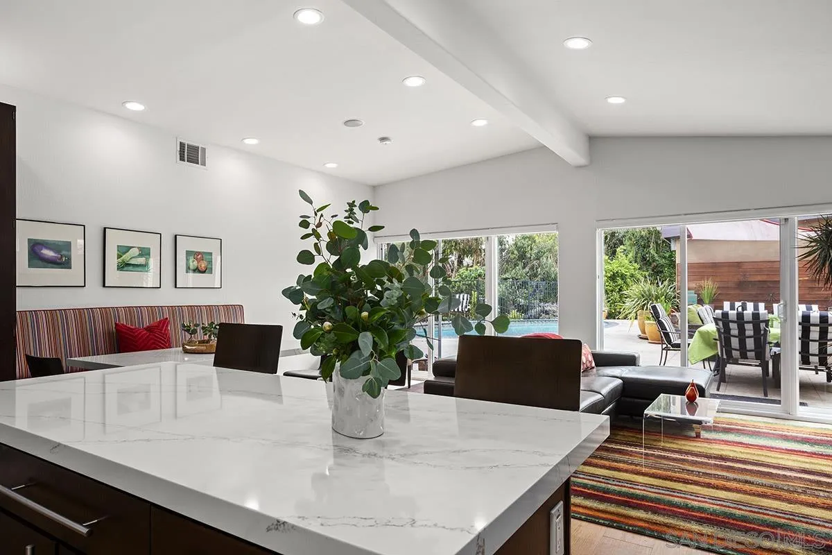 3433 Alabama Street San Diego, CA 92104 - Photo 20 of 58 a living room with furniture potted plant and a large window
