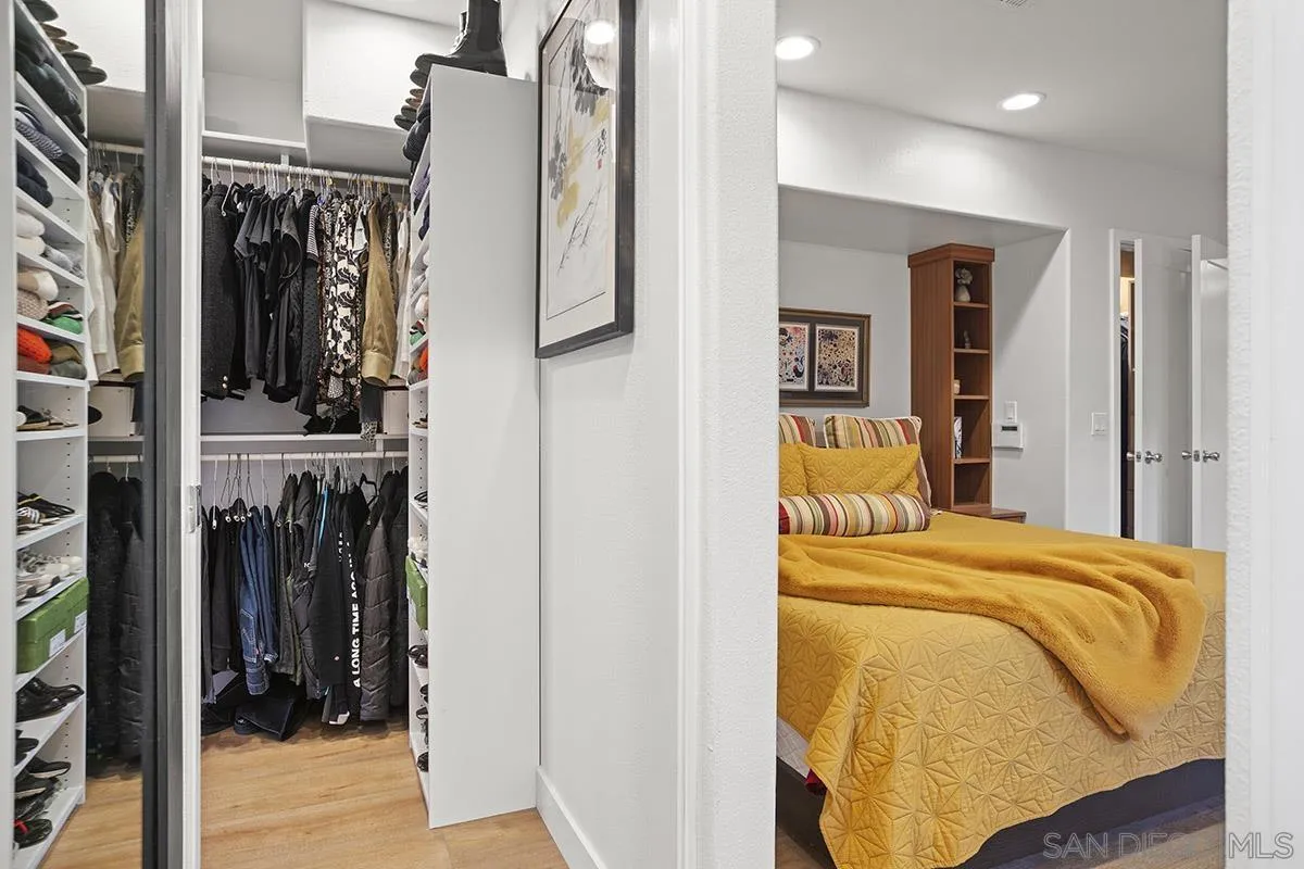 3433 Alabama Street San Diego, CA 92104 - Photo 32 of 58 a bed room with a bed and a mirror