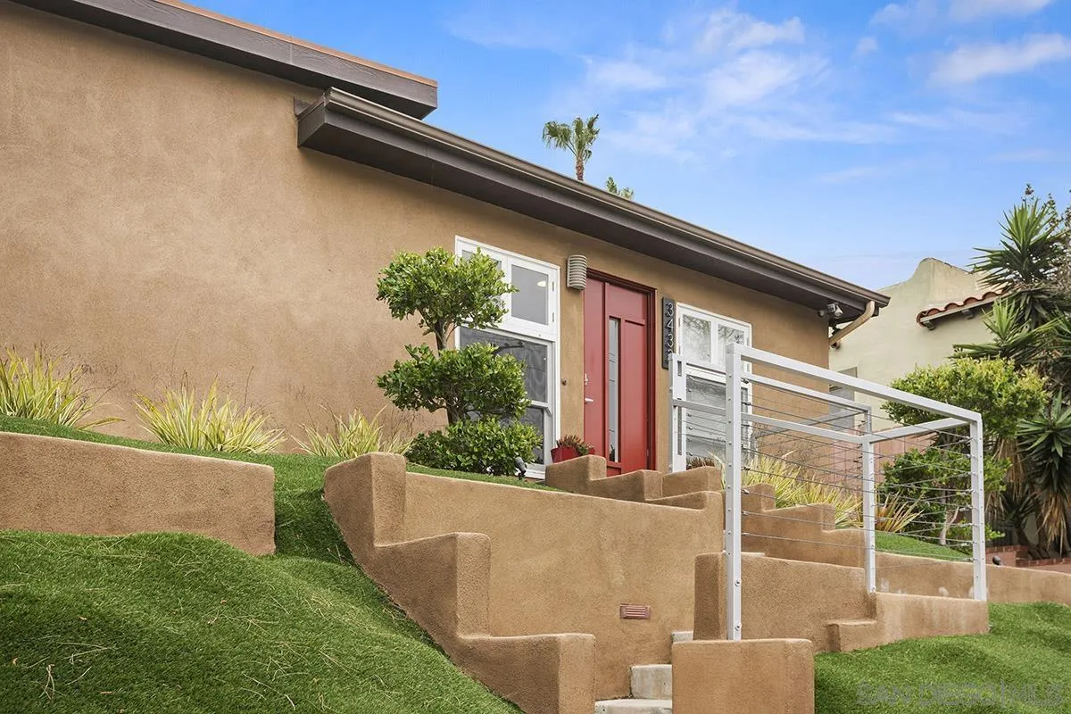 3433 Alabama Street San Diego, CA 92104 - Photo 5 of 58 a front view of a house with a garden