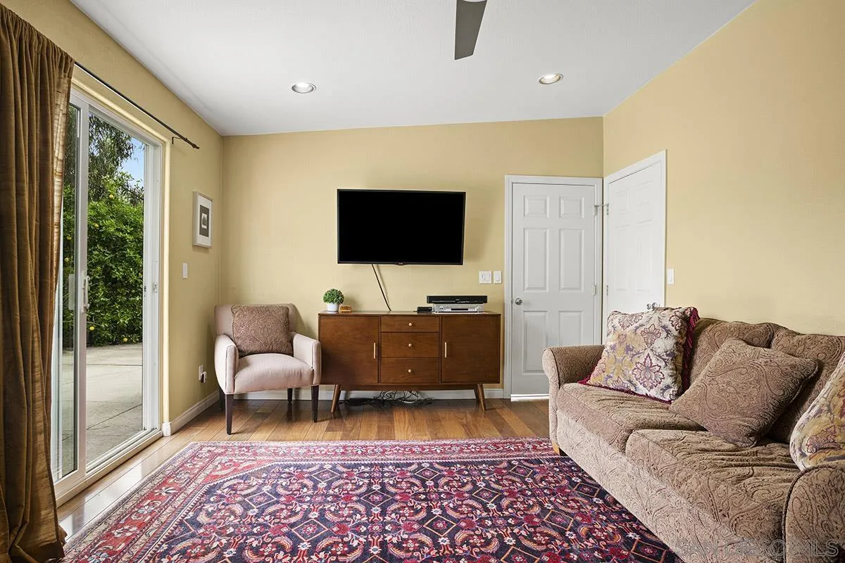 3433 Alabama Street San Diego, CA 92104 - Photo 55 of 58 a living room with furniture and a flat screen tv