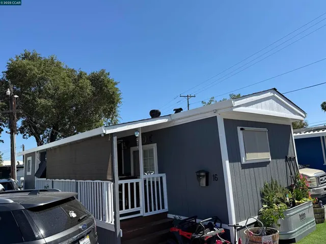 a view of balcony with furniture