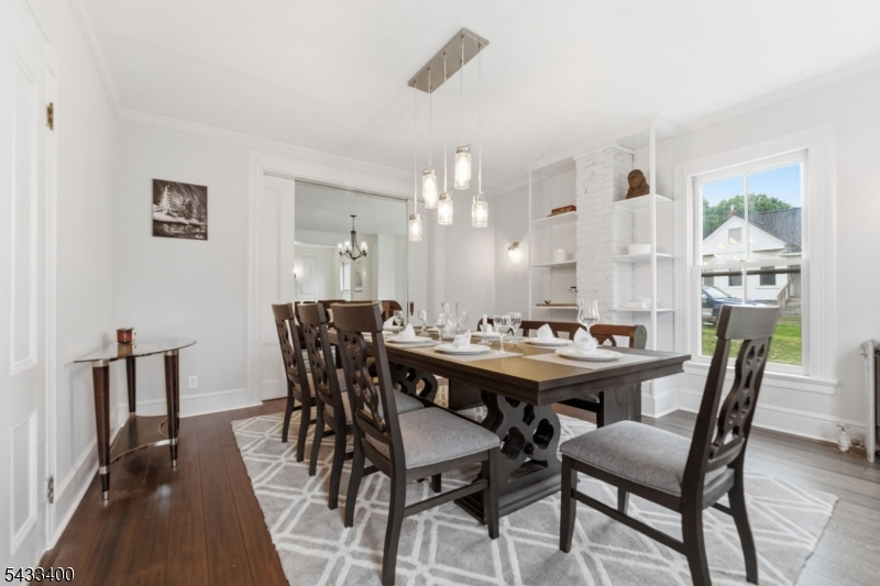61 New Street Hampton, NJ 08827 - Photo 14 of 45 a view of a dining room with furniture and wooden floor