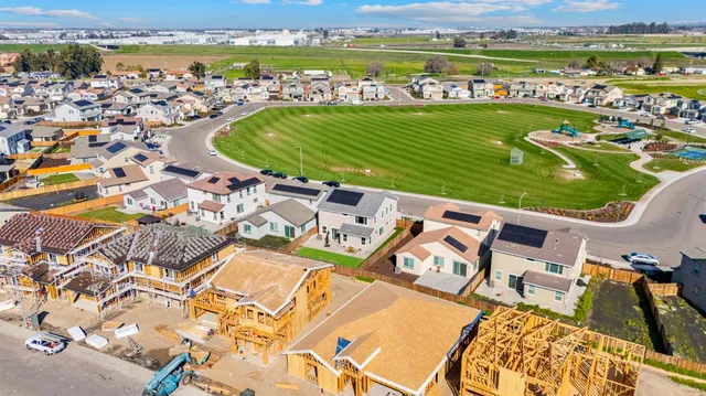 an aerial view of a house with a outdoor space