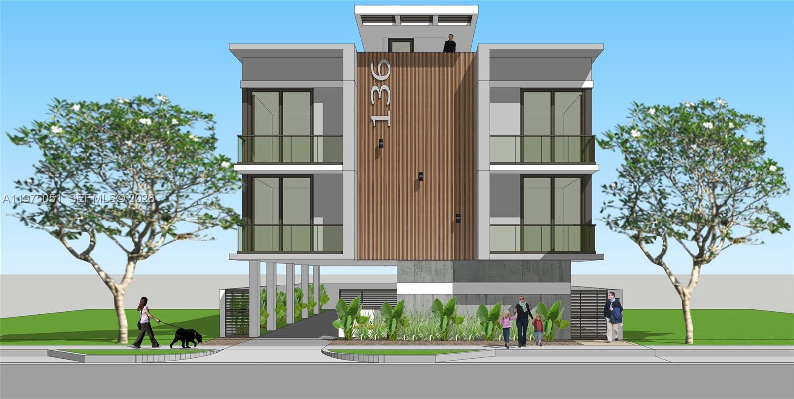 136 Southwest 11th Avenue Miami, FL 33130 - Photo 2 of 10 a front view of a house with a garden and trees