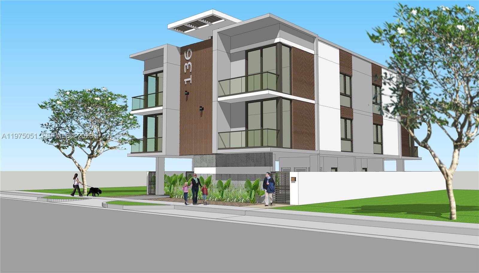 136 Southwest 11th Avenue Miami, FL 33130 - Photo 3 of 10 a front view of a house with a yard and garage