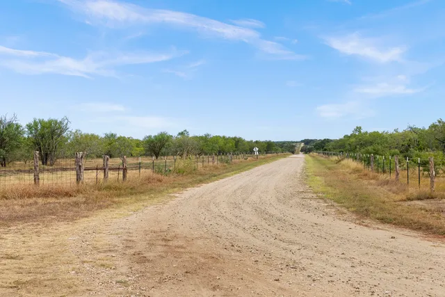 a view of lake with green space