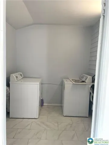 a utility room with a washer and dryer